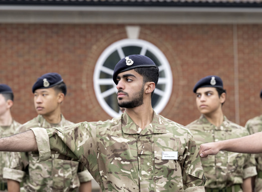 Officer Cadets on parade looking to the right.